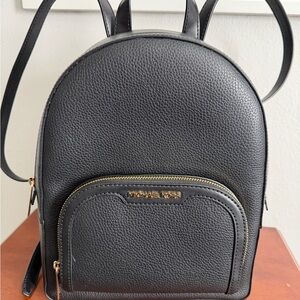 Michael Kors Black Pebbled Leather Mini Backpack with Gold Hardware